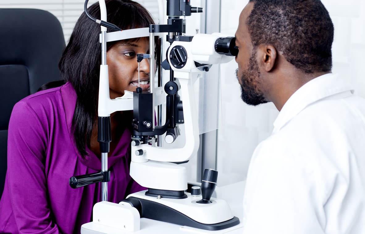 Eye doctor examining a patient