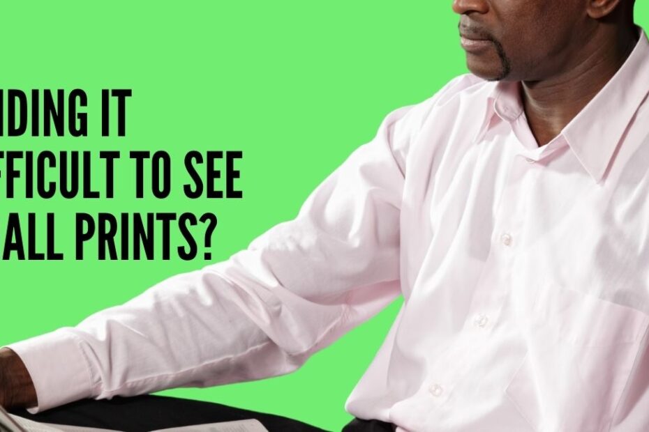 A man having difficulty reading small prints