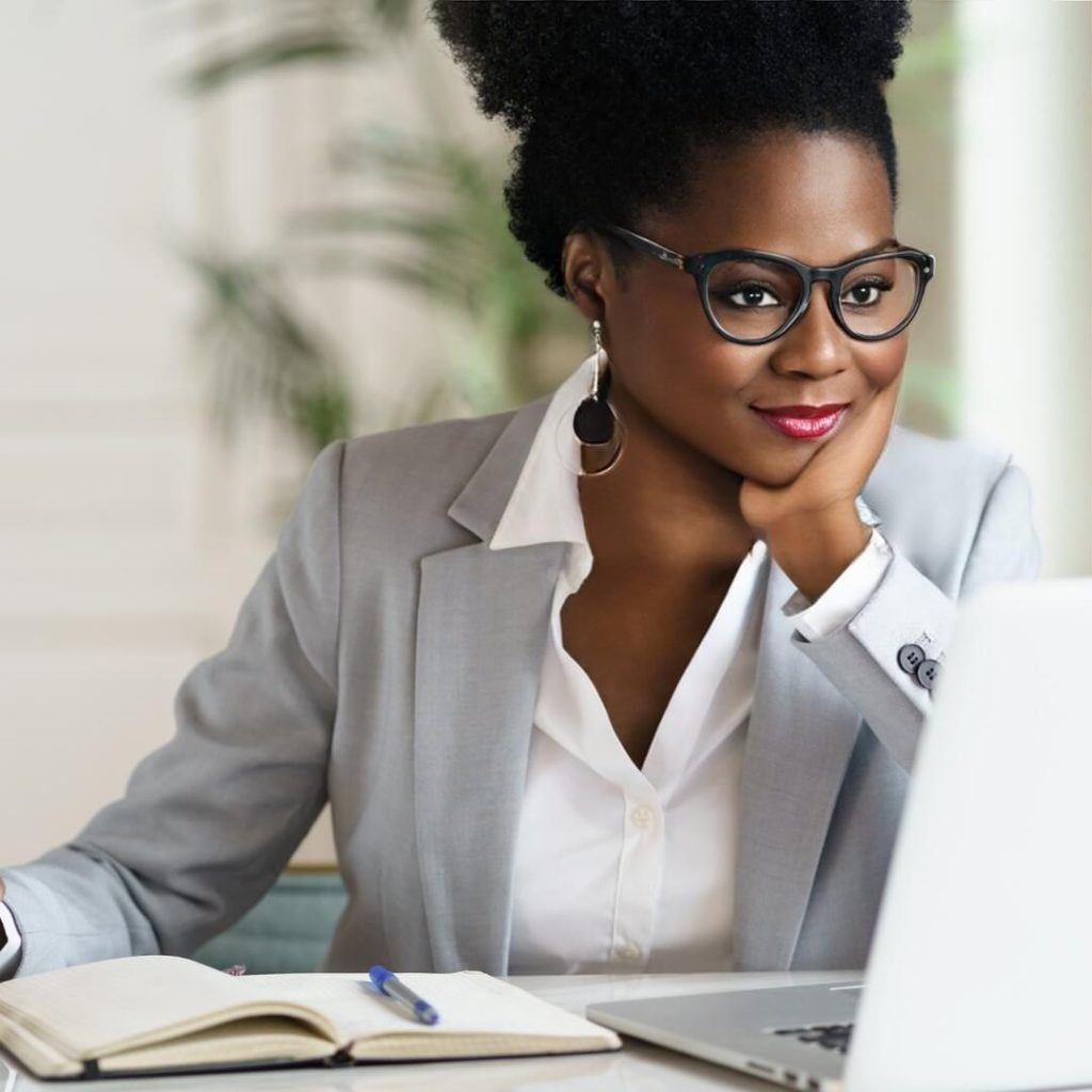 Middle aged woman wearing glasses to reduce digital eyestrain